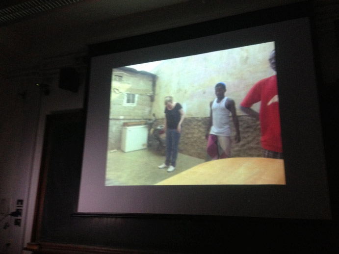 Stefanie Alisch showing us images of herself learning kuduro steps in quintals